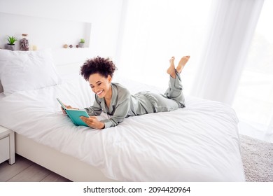 Photo Of Carefree Reader Lady Lay Bed Enjoy Morning Love Story Wear Silky Gown In Light Bedroom Home Indoors