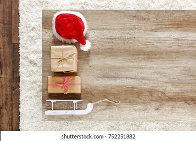 Photo Of Carpet Above The Floor. Free Space For Your Decoration. Red Santa Claus Hat.