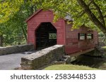 A photo of the Carroll Creek Covered Bridge in Frederick County MD taken in the Summer