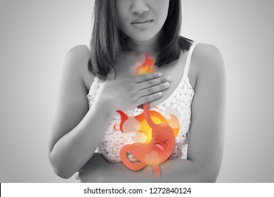 The Photo Of Cartoon Stomach On Woman's Body Against White Background, Acid Reflux Disease Symptoms Or Heartburn, Concept With Healthcare And Medicine