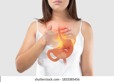 The Photo Of Cartoon Stomach On Woman's Body Against White Background, Acid Reflux Disease Symptoms Or Heartburn, Concept With Healthcare And Medicine