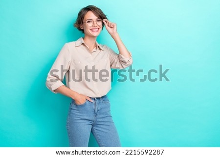 Photo of charming businesswoman wear stylish formal outfit bob brown hair touch her new glasses empty space brand ad isolated on cyan color background