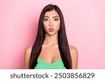 Photo of charming flirty young lady wear green tank-top sending you kiss isolated pink color background