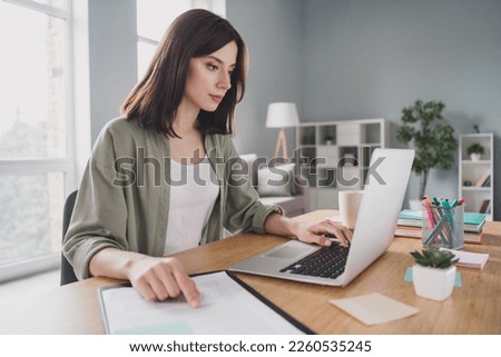 Photo of charming intelligent lady write economy finance statistic check weekly report use netbook macbook office room home indoor