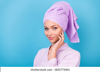 Photo of charming lady palm cheekbone look camera wear violet towel turban bathrobe isolated blue color background. - Powered by Shutterstock