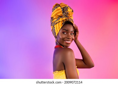 Photo of charming nice afro american lady smile look empty space wear turban isolated on abstract light background