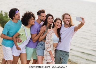 Photo Of Charming Positive Fellows Company Recording Self Video Enjoying Sunny Weather Outside Seaside Beach