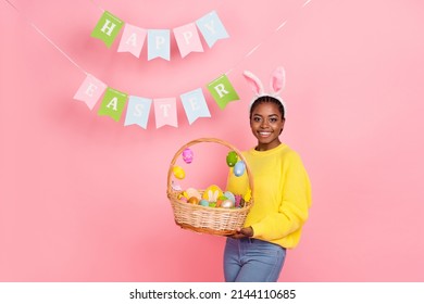 Photo Of Charming Positive Girl Hold Easter Food Basket Have Good Mood Isolated On Pink Color Background