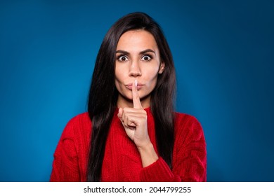Photo charming strict young lady wear knitted sweater finger lips ask not tell secrets isolated gradient blue color background