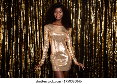 Photo of charming stunning dark skin lady wear sequins dress smile party isolated on shine glitter color background