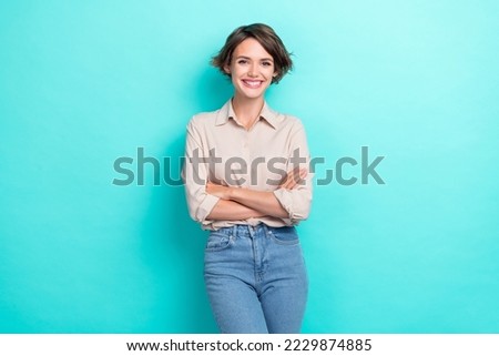 Photo of charming successful pretty girl employer wear smart casual outfit crossed hands career office manager isolated on aquamarine color background