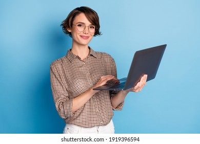 Photo Of Charming Young Person Hands Hold Use Laptop Smile Look Camera Isolated On Blue Color Background