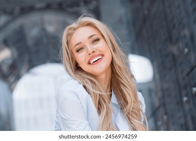 Photo of cheerful cute adorable girl laughing looking camera enjoying free time sunny weather outdoors - Powered by Shutterstock