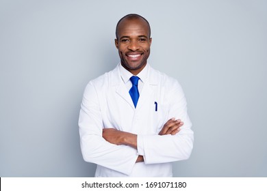 Photo of cheerful doctor dark skin guy virologist agent corona virus seminar conference arms crossed pandemic virus expert wear white lab coat tie isolated grey color background - Shutterstock ID 1691071180