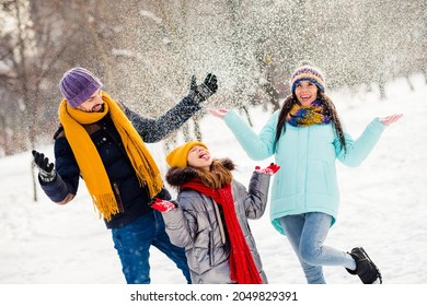 Photo of cheerful family happy positive smile have fun enjoy time together playful fly air snow walk park