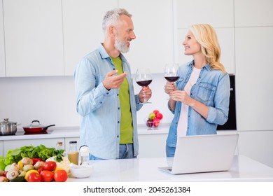 Photo Of Cheerful Good Mood Smiling Married Couple Have Date Night Celebrate Anniversary Drink Wine Talking Each Other