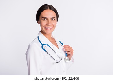 Photo of cheerful good mood young lady doctor dressed uniform smiling arm stethoscope isolated white color background