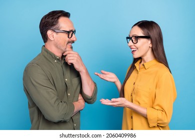 Photo of cheerful happy people partners talk smile conversation glasses isolated on blue color background