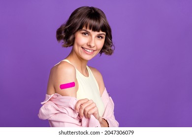 Photo Of Cheerful Happy Young Woman Vaccine Arm Shoulder Smile Approve Isolated On Purple Color Background