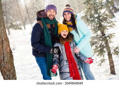 Photo of cheerful lovely family mommy daddy daughter happy positive smile snowy weather walk park weekend