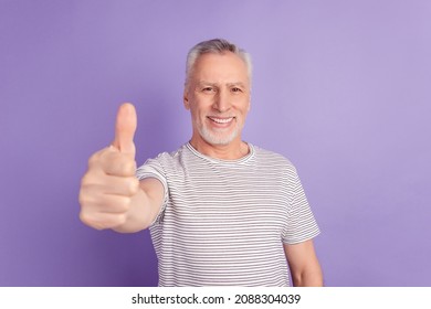 Photo of cheerful man show fingers okey symbol recommendation ads isolated over violet color background