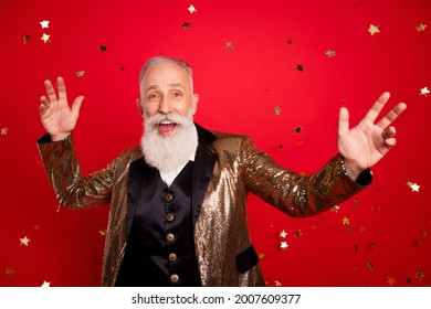 Photo Of Cheerful Old Positive Man Fall Confetti Stars Party Television Presenter Smile Isolated On Red Color Background