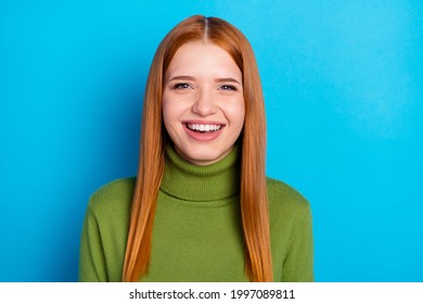 Photo Of Cheerful Red Hair Lady Wear Green Sweater Isolated On Blue Color Background