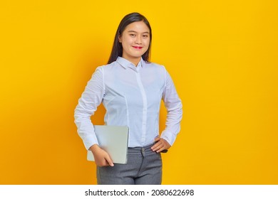 Photo Of Cheerful Young Business Woman Carrying Laptop Over Yellow Background