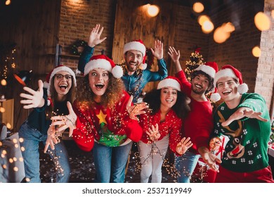 Photo of cheerful young people friends group have fun dance wave hand cheerful smile cozy christmas party decor spacious apartment indoors - Powered by Shutterstock