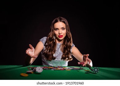 Photo Of Classy Lady Sit Casino Table Throw Chips Look Camera Wear Glossy Dress Isolated Black Color Background