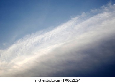 
Photo of clouds across the diagonal in the afternoon - Shutterstock ID 1996022294