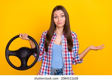 Photo Of Clueless Driver Lady Prepare Achieve License Hold Steering Wheel Wear Plaid Shirt Isolated Yellow Color Background