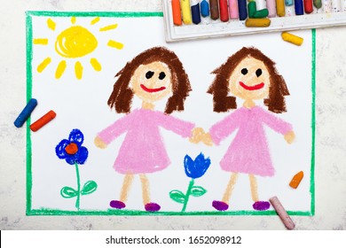 Photo Of Colorful Drawing: Identical Twins. Two Smiling Sisters Look The Same