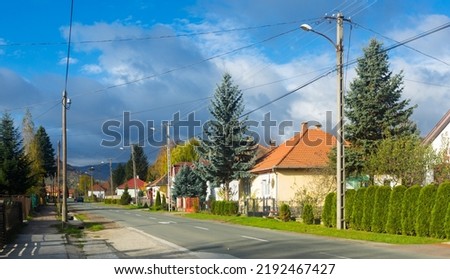 Photo of colorful typical hungarian village outdoor.