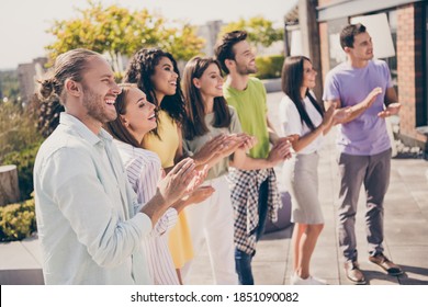 Photo of company of friends standing smile enjoy arms clap applaud weekend meeting restaurant outside - Powered by Shutterstock