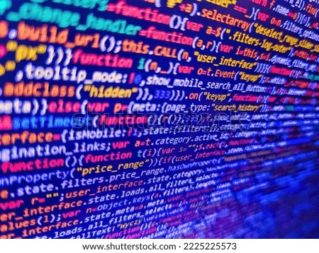 Photo of computer digital background. Abstract computer script  code. Application web source code on monitor. Shallow depth of field, selective focus effect. HTML code on lcd screen