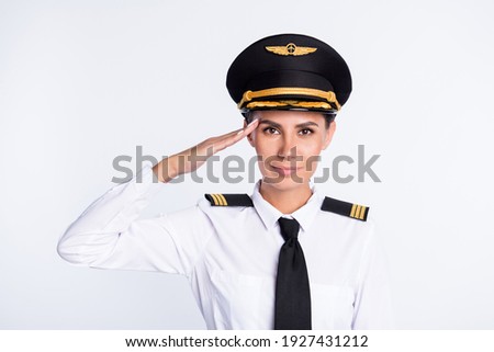 Photo of confident soldier lady give salute wear headwear aviator uniform isolated white color background