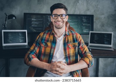 Photo of confident successful front end developer sitting chair database optimization laptop pc display desk office indoors