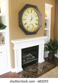 A Photo Of A Contemporary Fireplace, Mantle, And Clock