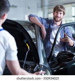 Photo of content male customer of car service station - Shutterstock ID 350934023