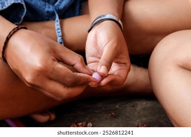 Photo of the cooking process. Photo of a hand peeling an onion with a knife. Close up cooking process.  - Powered by Shutterstock