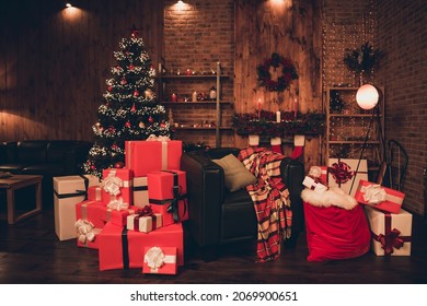 Photo of cozy north-pole santa claus house christmas tree season present chair indoors inside home apartment