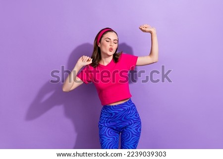 Photo of crazy carefree person closed eyes pouted lips dancing partying isolated on violet color background