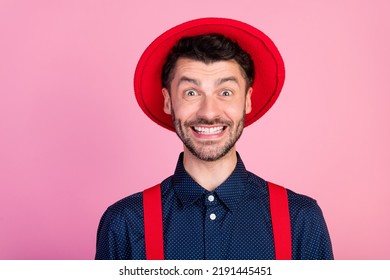 Photo of crazy cheerful person toothy beaming smile wear red hat isolated on pink color background