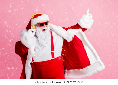 Photo of crazy funky santa claus enjoy listen x-mas christmas newyear fairy radio song headphones wear sunglass pants suspenders isolated over pastel color background - Powered by Shutterstock