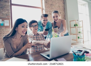 Photo Of Crazy Laughing College Students Groupmates Relaxing From Lessons Watch Tv Show Drinking Yummy Takeout Cappuccino