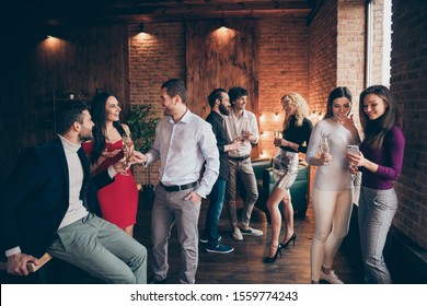Photo of crowd of working people engaged in business having corporate party with fun and alcohol wearing formally talking with each other shaping communication