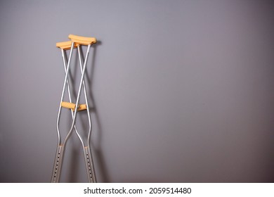 Photo Crutches On Gray Background Stock Photo 2059514480 | Shutterstock