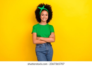 Photo of cute confident lady wear green t-shirt hairband arms crossed isolated yellow color background - Shutterstock ID 2367365707