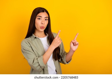 Photo Of Cute Interested Female Point Fingers Up Recommend Black Friday Bargains Isolated On Yellow Color Background